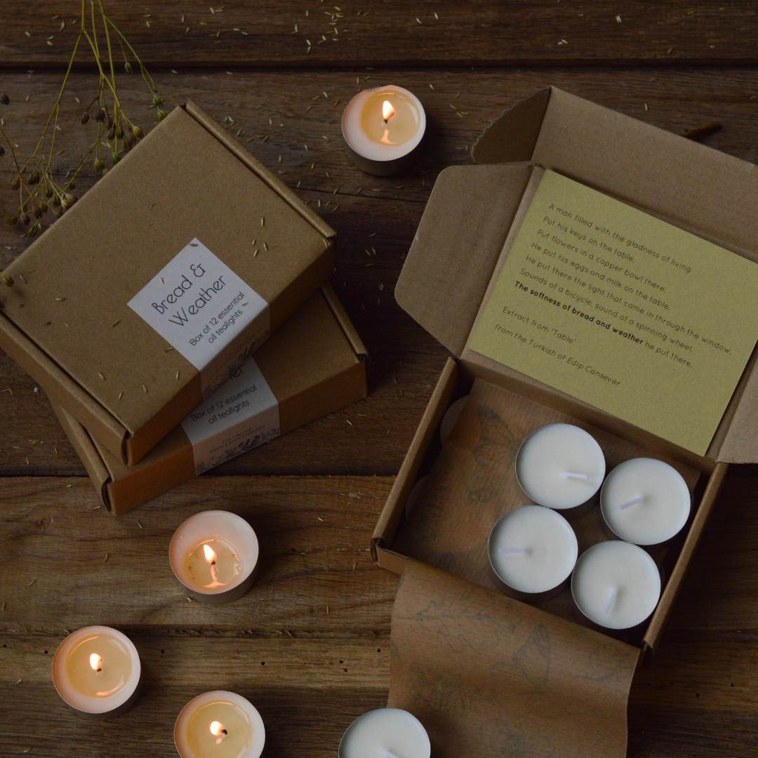 An open box with tea lights