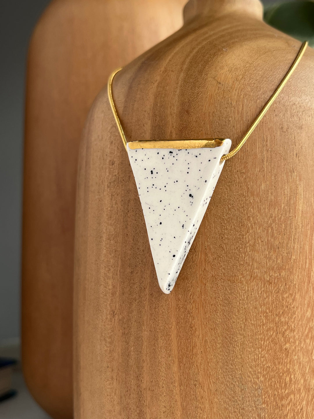 Handmade triangular white speckle necklace with gold by Julia Fraia